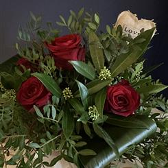 Half A Dozen Roses In A Box